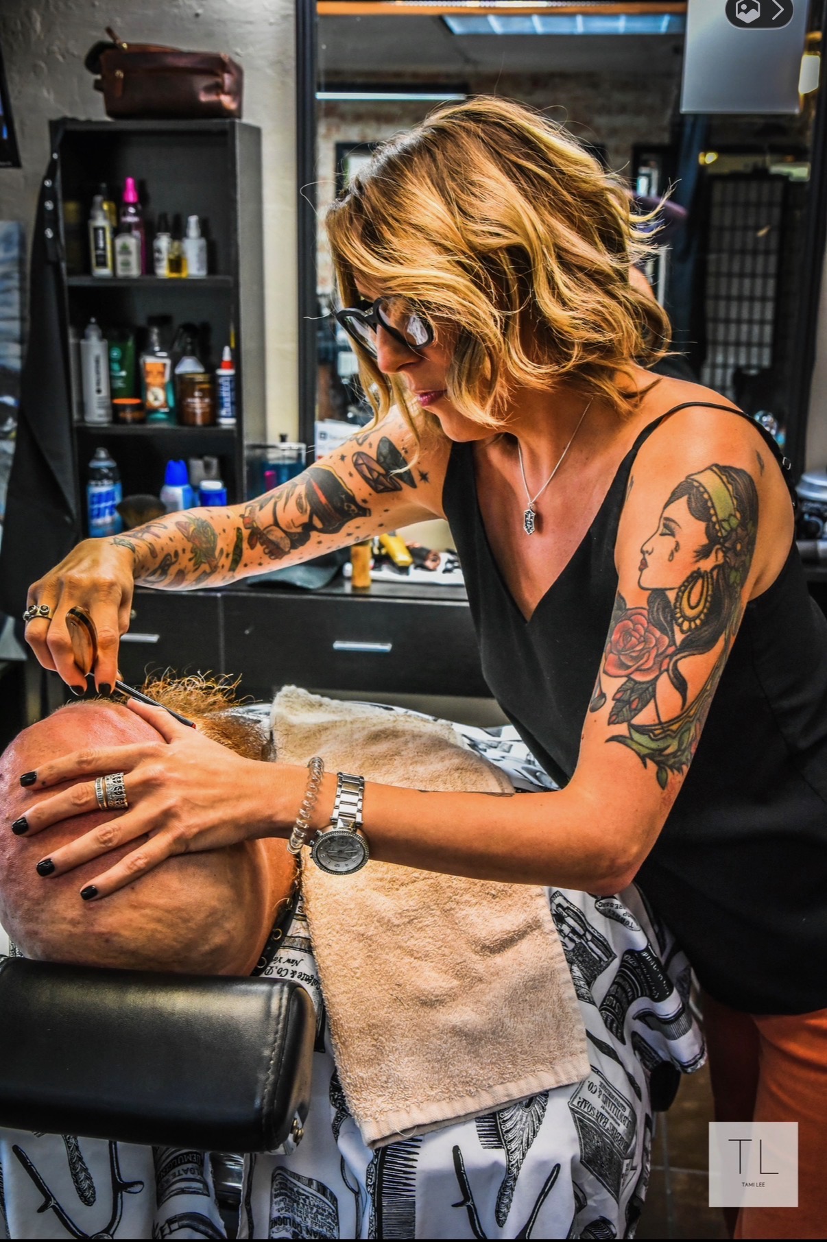 Tami Lee giving a close straight razor service